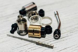 Parts for electronic cigarette vape, dripper, tank photo