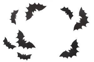 Paper bats on a purple background, Halloween concept photo