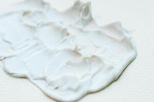 The texture of a cosmetic care cream-scrub. photo