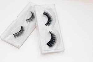 False decorative eyelashes on a white background. photo