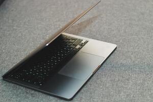 Laptop series flat metal on the table photo