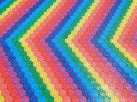 A colorful zigzag pattern on carpet photo