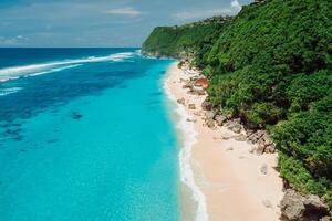 Aerial view of luxury beach with blue ocean in Bali photo