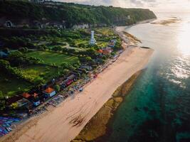 Pandawa beach with scenic landscape, lighthouse and ocean in Bali. photo