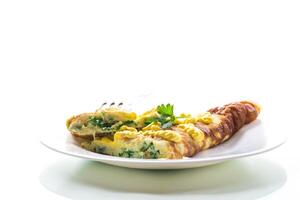 fried omelette stuffed with herbs, parsley, dill photo