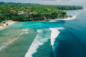 Aerial view of ocean with waves and scenic coastline in Bali photo