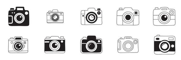 Collection of camera silhouette in doodle style. Camera icons set. Hand drawn art. vector