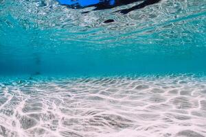 Transparent ocean in tropics with white sand underwater at Hawaii photo