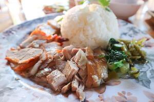 stewed pork ,pork with rice or rice with stew pork and fried pork photo