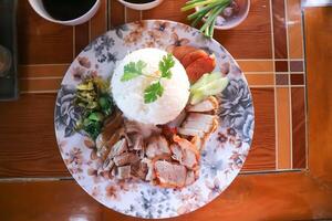 stewed pork ,pork with rice or rice with stew pork and fried pork photo