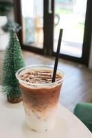 iced coffee , iced latte coffee or iced cappuccino coffee and Christmas decoration photo