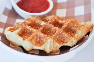 croffle or waffle or croissant , French croissant or French bread with sugar photo