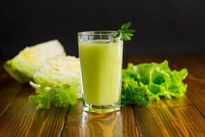 vegetarian smoothie made from green vegetables, cabbage, lettuce, greens photo