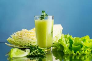 vegetarian smoothie made from green vegetables, cabbage, lettuce, greens photo