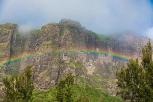 Rainbow and Le Morn brabant mountain in Mauritius photo