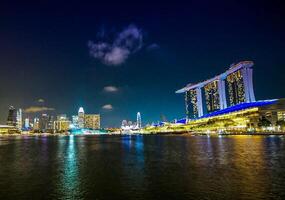 Singapore's Marina Bay nighttime skyline featuring the Marina Bay sands. photo