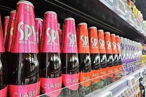 Bangkok, Thailand May 18, 2024 Spy Wine Cooler on Shelf. It is South East Asia's No. 1 best-selling wine-based drinks. photo