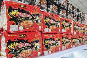 Bangkok, Thailand May 18, 2024 Samyang 2x Spicy Hot Chicken Flavor Ramen on the shelf in Supermarket. it is a famous instant noodles in Thailand. photo