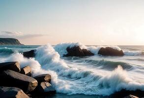 Ocean waves breaking against the rocks photo