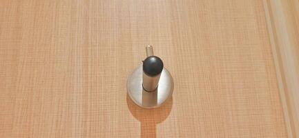 Door stopper wall. Stainless magnetic door in toilet photo