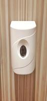 Automatic soap dispenser or hand sanitizer machine to clean bacteria and hygiene hands in toilet photo