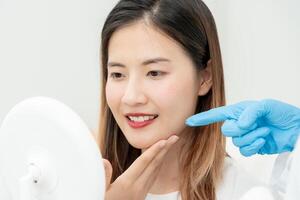 beauty asian smile and happy after surgery, Cosmetic surgery, skin whitening injection, filler injection, Skin reface, beautiful Asian girls receive beauty treatments at beauty clinic, skincare photo