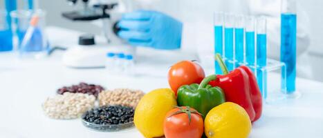 Scientist check chemical fruit residues in laboratory. Control experts inspect the concentration of chemical residues. hazards, standard, find prohibited substances, contaminate, Microbiologist photo