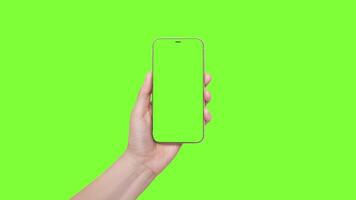 A woman's hand holds a phone chromakey Mockup and presses button finger in the center of the screen. Isolated on chromakey background 4k video
