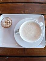 A cup of salep on the table photo