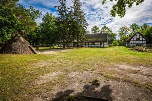 Old wooden house in Kluki, Poland photo