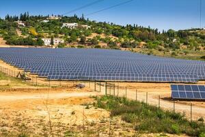 Solar panel produces green, environmentally friendly energy from the sun photo