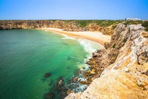 Beautiful bay and sandy beach of Praia do Beliche near Cabo Sao Vicente, Algarve region, Portugal photo