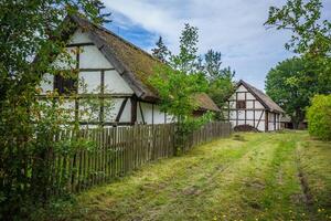 Traditional thatched house Kluki Poland photo