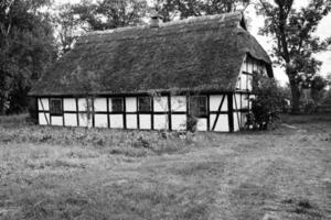 Traditional thatched house Kluki Poland photo