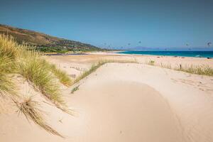 Valdevaqueros beach in spain with africa at horizon photo