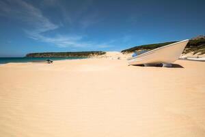 boat at bolonia beach a coastal village in the municipality of Tarifa in the Province of Cadiz in southern Spain. photo