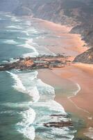 Sandy Castelejo beach, famous place for surfing, Algarve region, Portugal photo