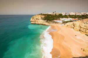 Praia de Benagil beach on atlantic coast, Algarve, Portugal photo