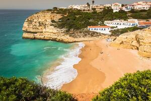 Praia de Benagil beach on atlantic coast, Algarve, Portugal photo