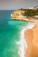 Praia de Benagil beach on atlantic coast, Algarve, Portugal photo