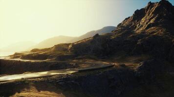 Scenic view of empty road amidst volcanic landscape photo