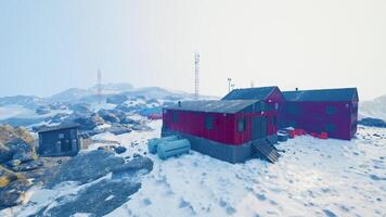 antarctic base set in a natural harbor in front of the Antarctic Peninsula photo