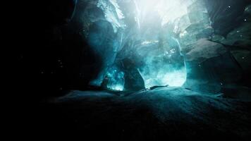 Entrance of an ice cave inside glacier in southern Iceland photo