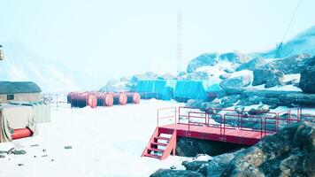 antarctic base set in a natural harbor in front of the Antarctic Peninsula photo