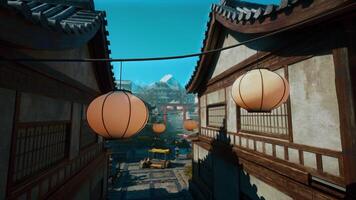 A couple of lanterns hanging from a line photo