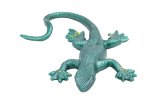 Green rubber lizard toy with no background. Stretchable toy. Anti-stress. Horizontal photo. For text. png