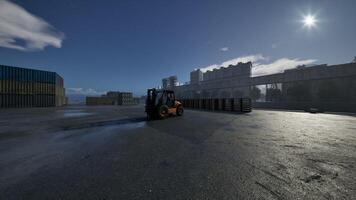 Forklift Operating in a Container Yard at Dusk photo