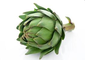 Greeen artichoke isolated on white background. photo