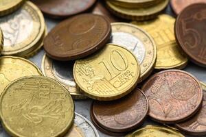 Euro coins scattered on the table as a background 1 photo