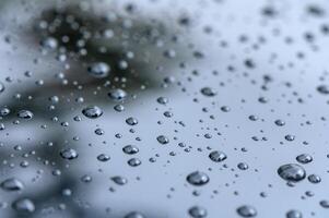 Raindrops on the surface of the car glass. Raindrops natural abstract background.2 photo